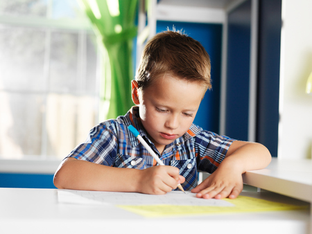 Boy Writing a Letter