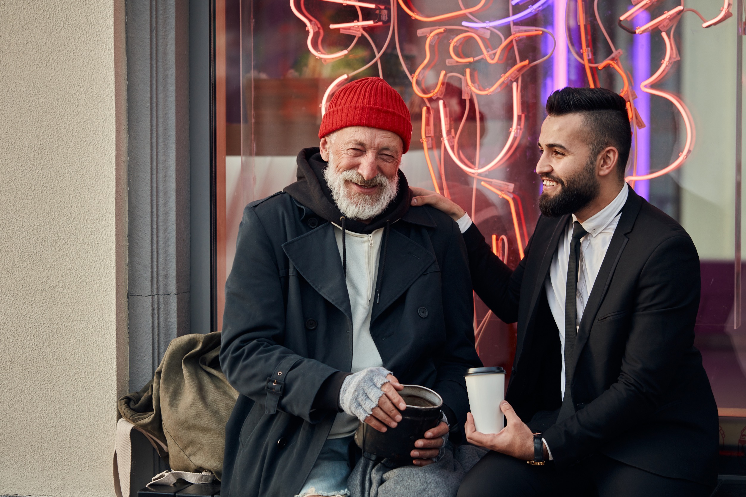 Businessman and Homeless Man