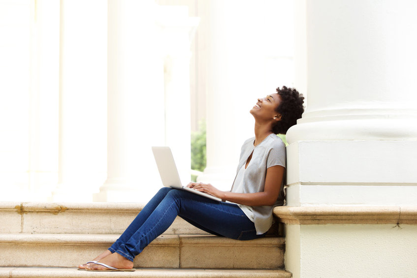 Young Woman Sitting on Steps