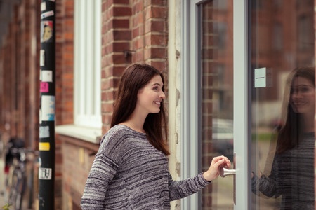 Woman Entering Door