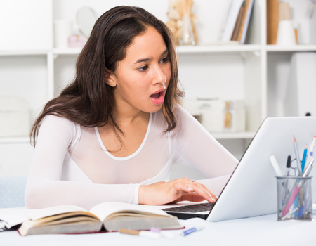 Young Woman Looking at Computer Screen