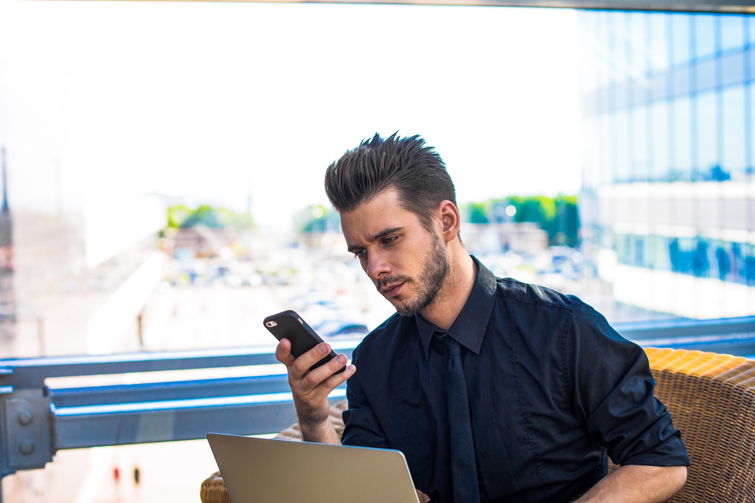 Man Reading a Text Message