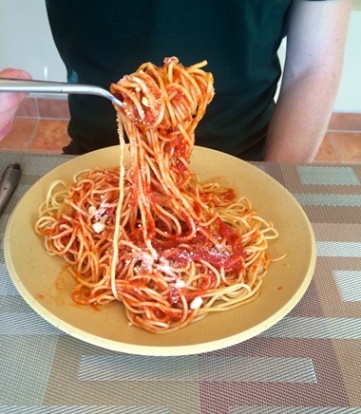 A big bite of spaghetti