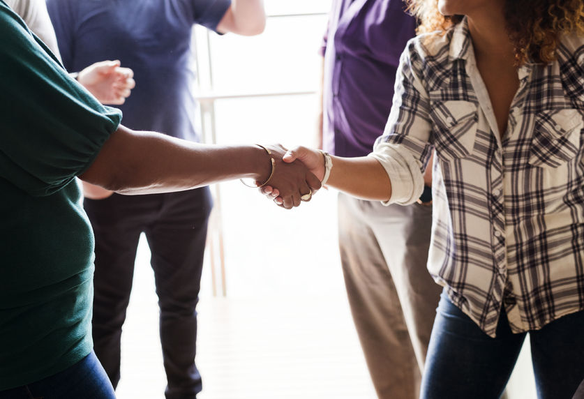 Woman Shaking Hands