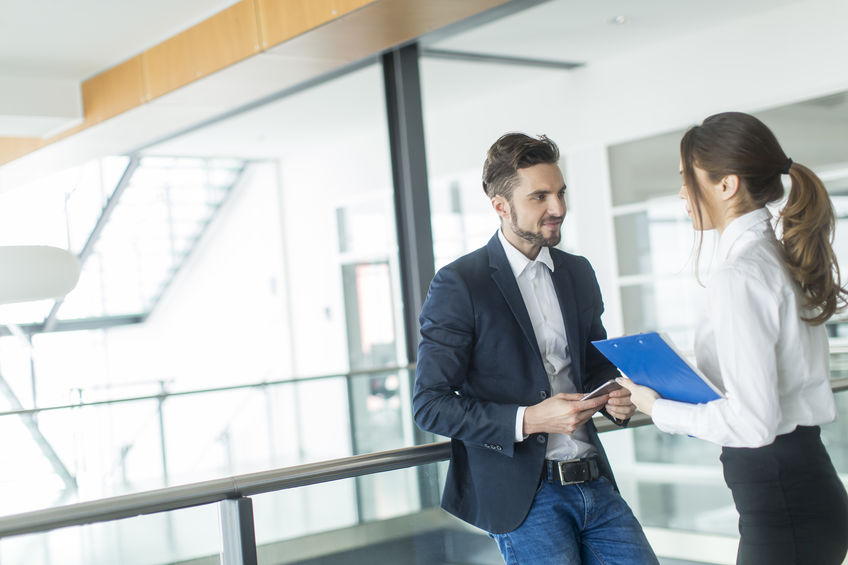 Young Couple in Office Setting